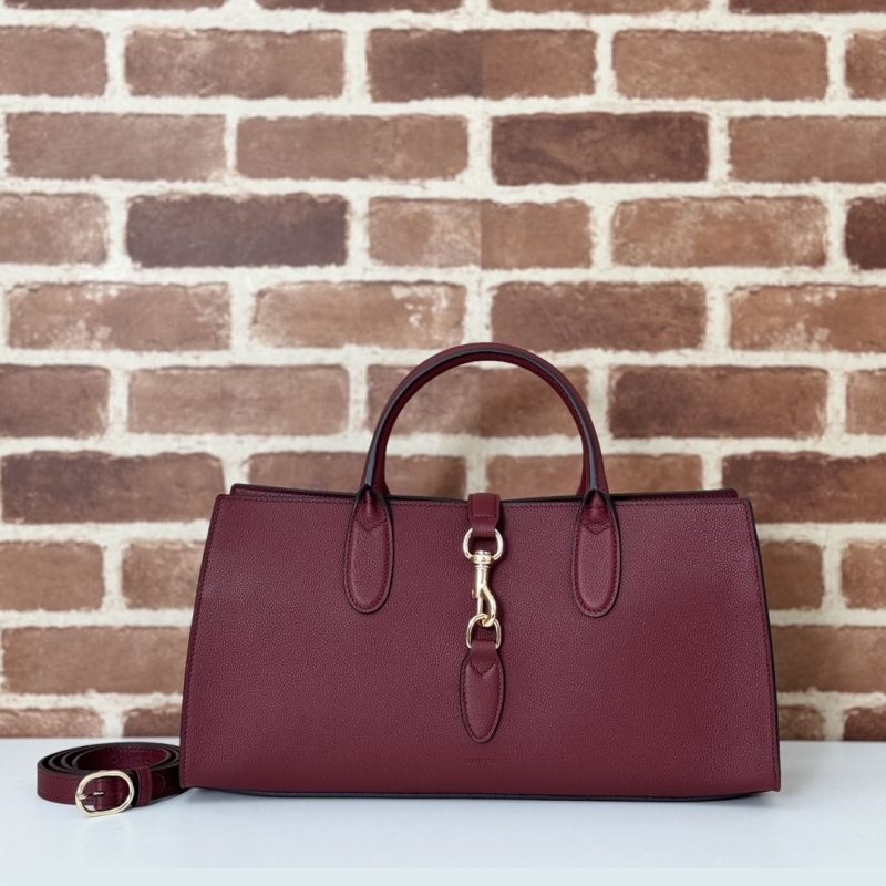G*u*i top handle bags